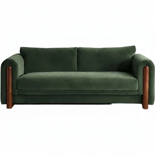 The same sofa in forest green velvet